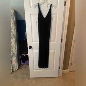 Sweater dress. V-neck sleeveless. Boutique find.